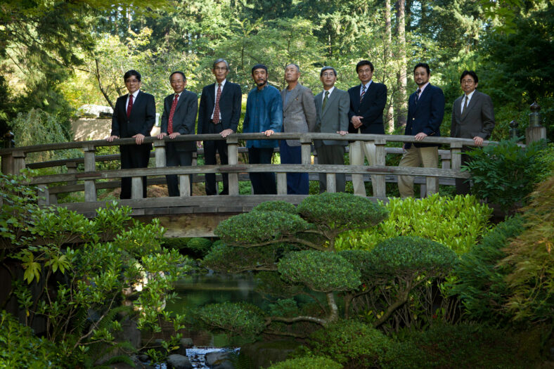 The Garden Directors of Portland Japanese Garden standing on a bridge in 2010.