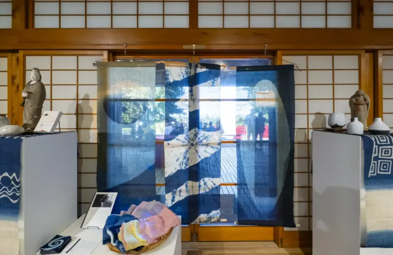 Indigo tapestries and other other goods on display during Portland Japanese Garden's annual summer marketplace.