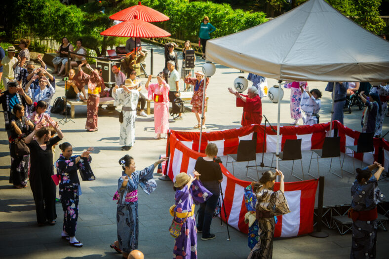 People dancing in Portland Japanese Garden during the Bon Odori festival.